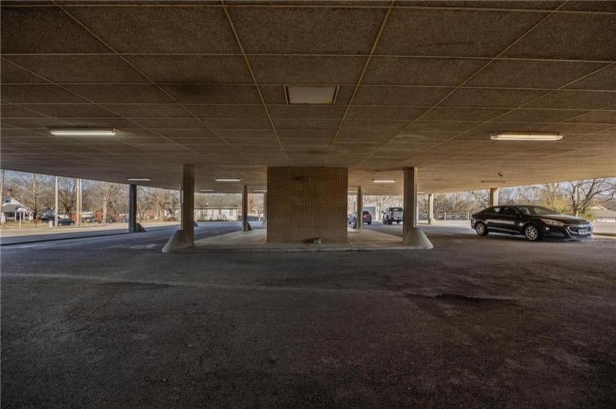 Covered parking beneath the building